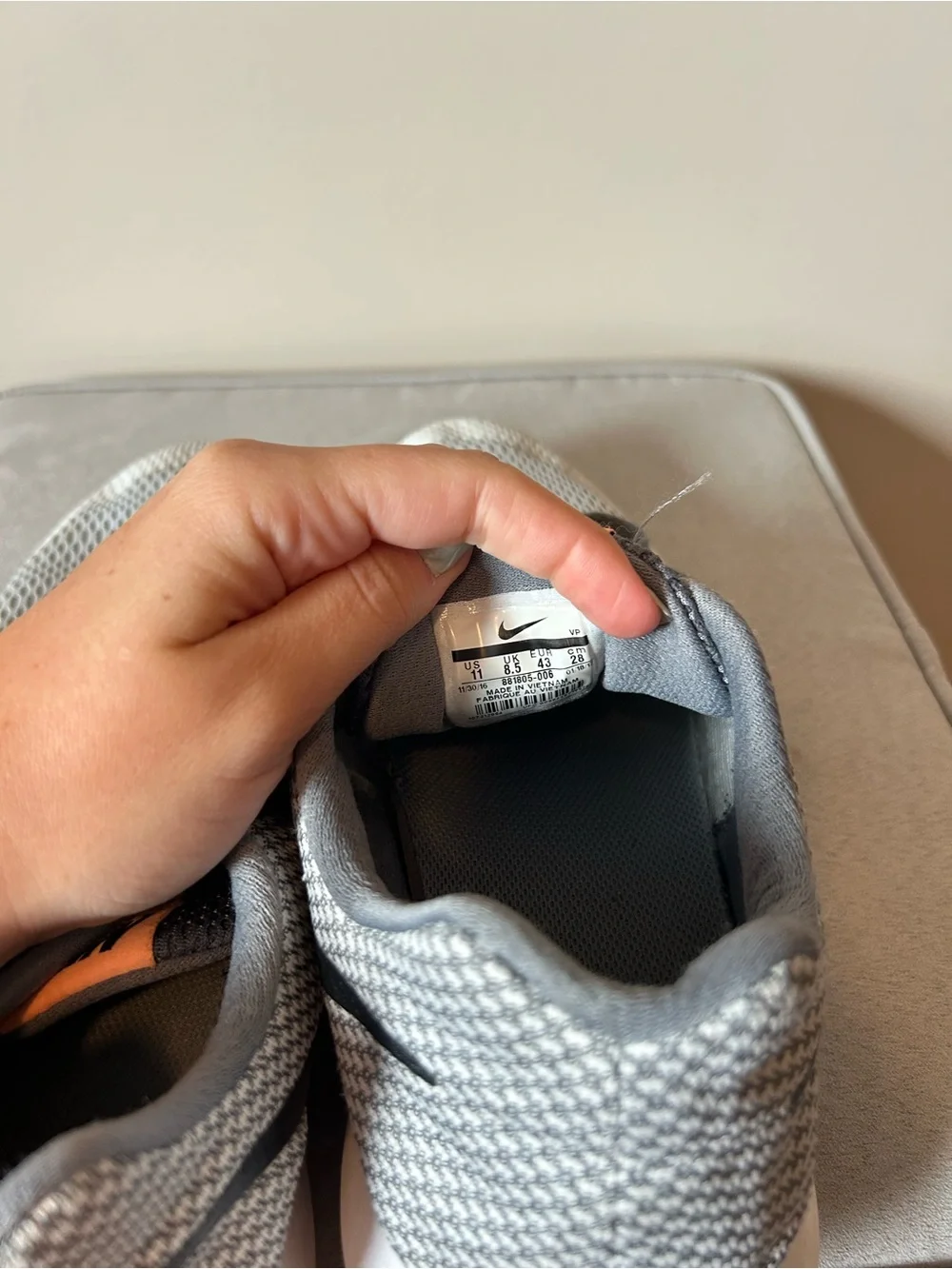 Nike women’s Gray & Black Mesh Sneakers with Orange Accents